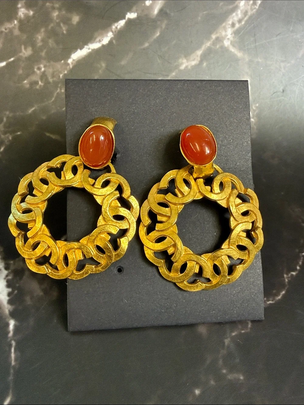 CHANEL Gold-Tone Link Hoop Earrings with Red Cabochon